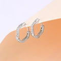 Wavy CZ Silver Hoop Earrings